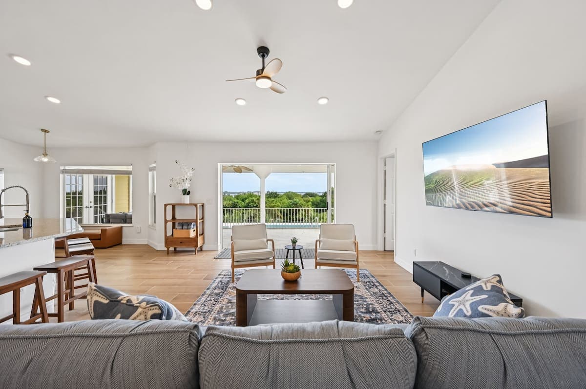 Living room opening onto the covered balcony